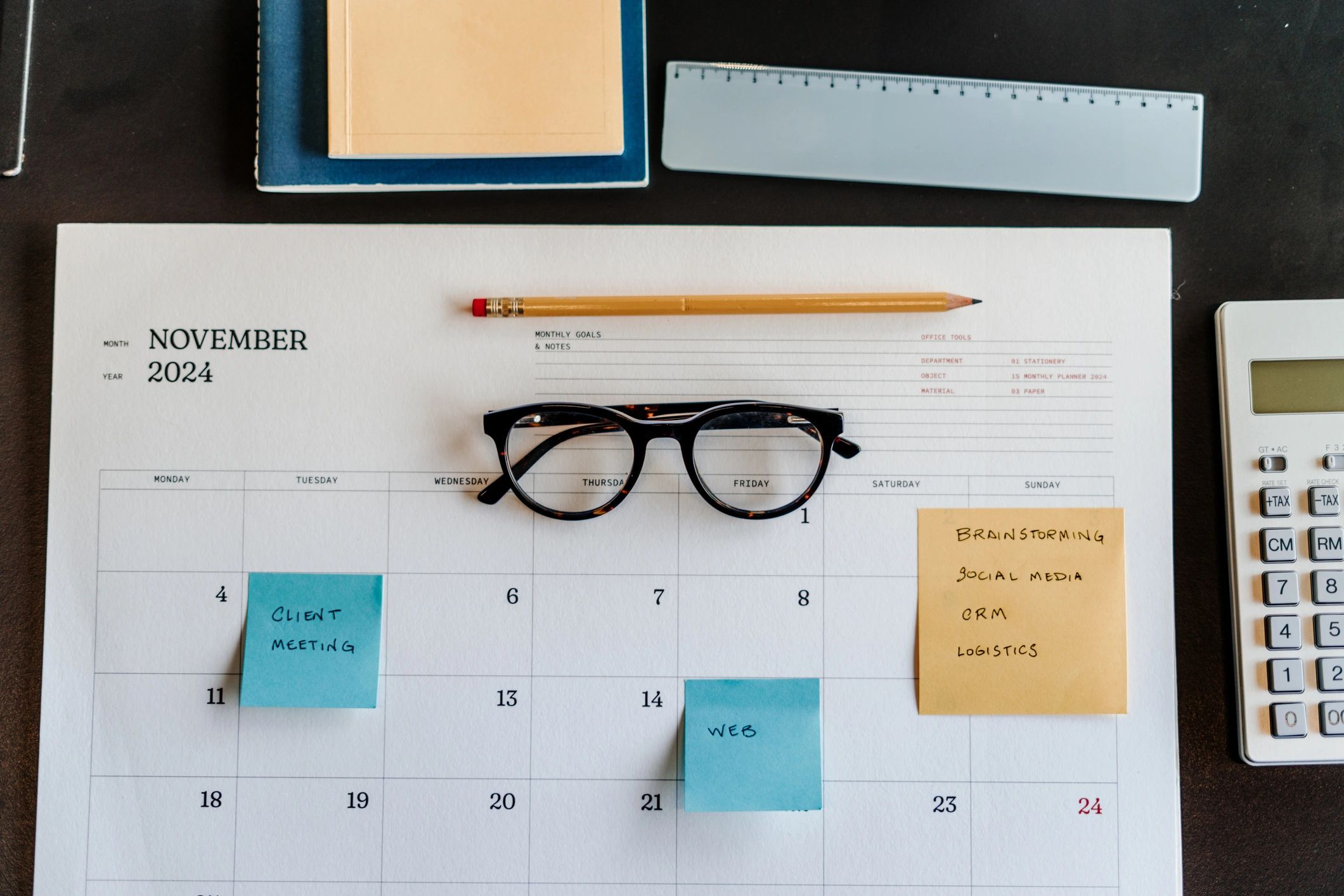 Event planning workspace with a desk and notebook